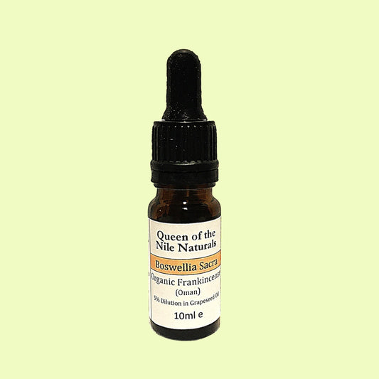 Boswellia sacra essential oil in a glass Amber bottle with pipet