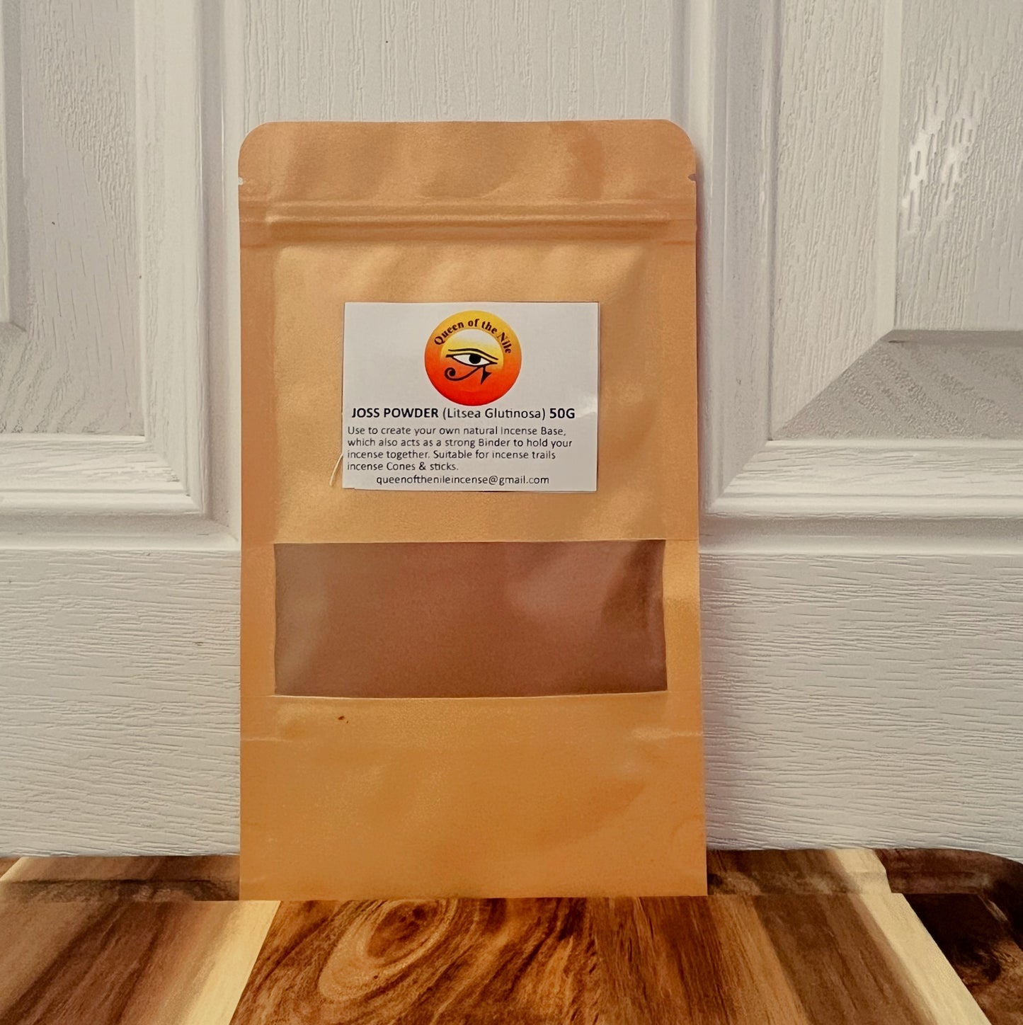 Joss powder in a brown paper puch