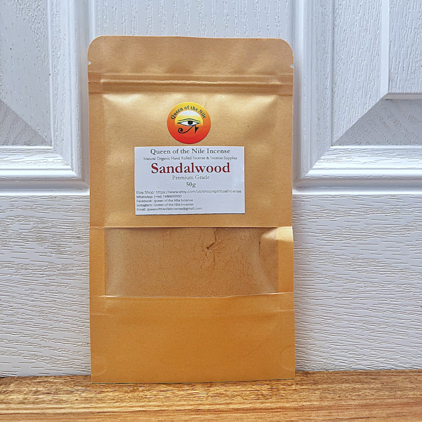 sandalwood powder in  a brown paper pouch for makng incense sticks/cones and loose incense